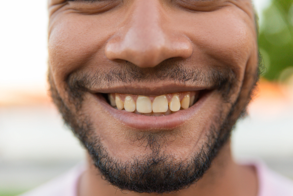 closeup-smiling-male-face