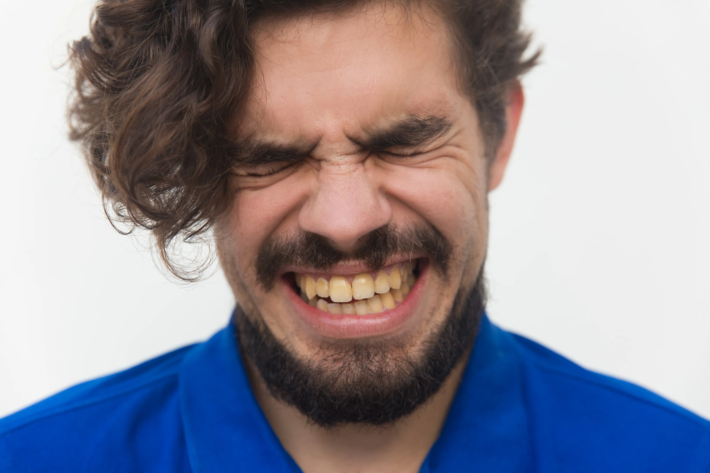 closeup-stressed-unhappy-male-face