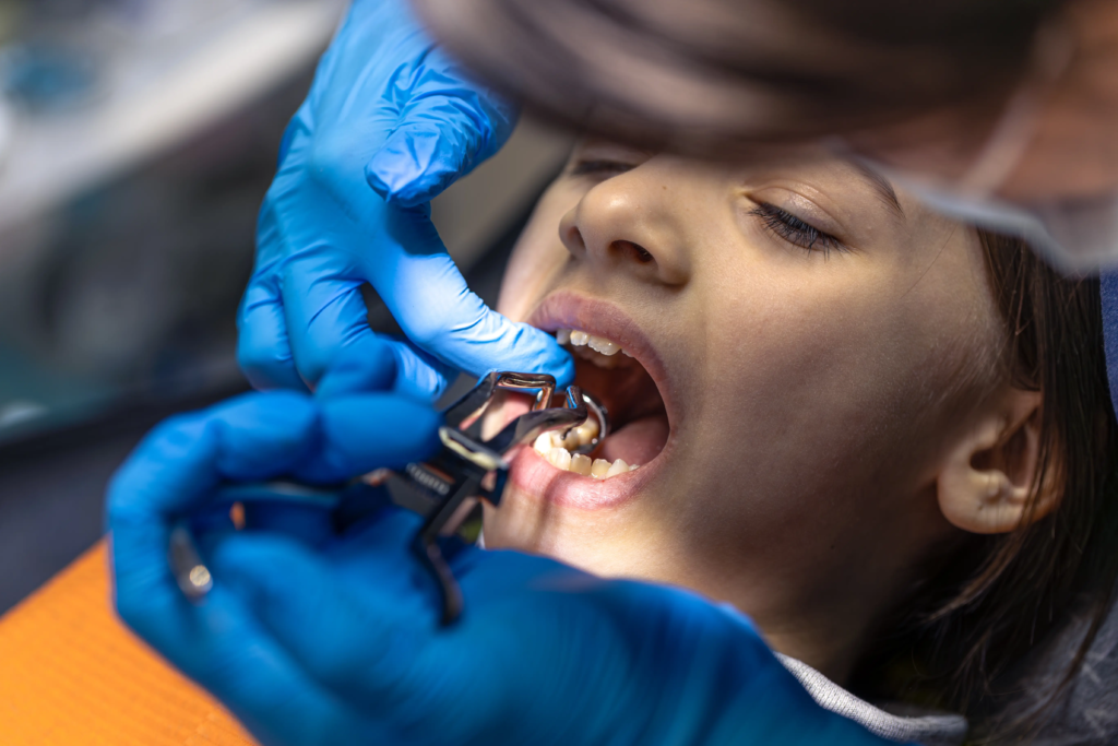 girl-dentists-office-dentist-examining-child-patients-teeth-dentistry-concept